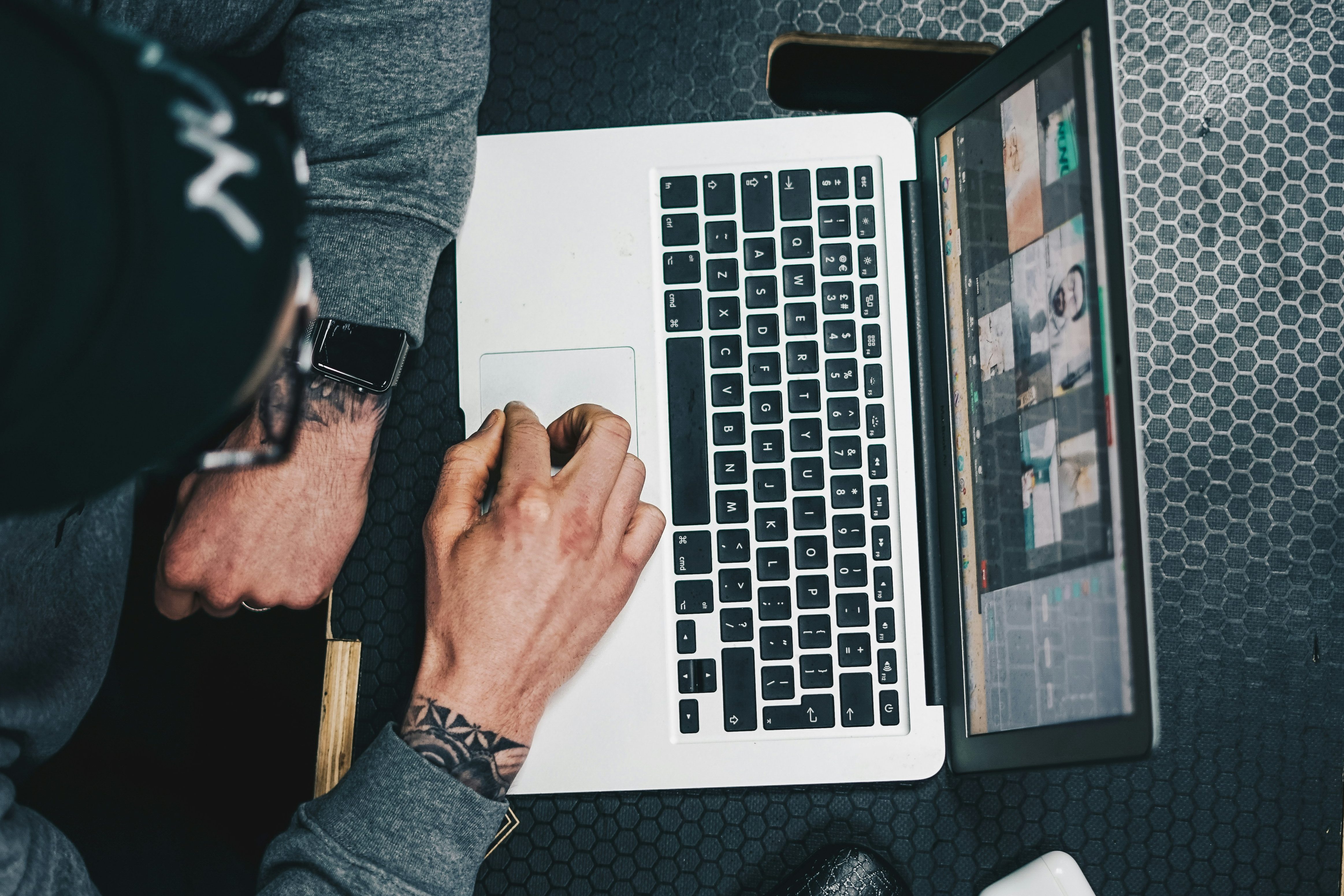 person working on laptop computer.